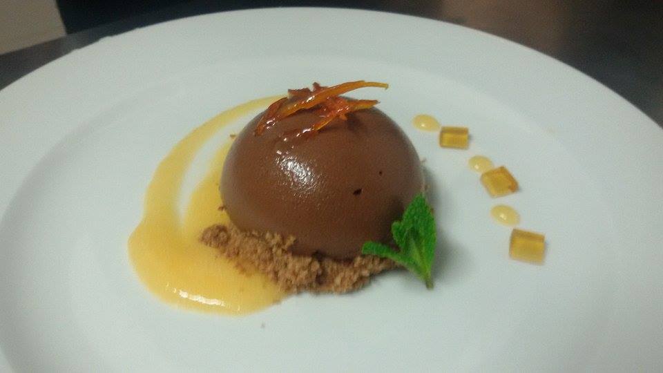 Cheesecake al cioccolato con salsa al mandarino